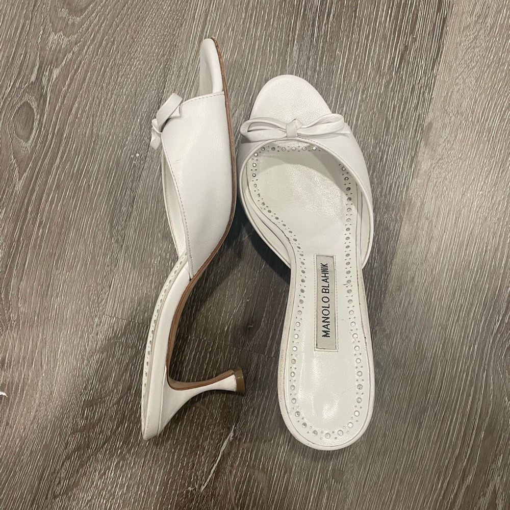 White leather bow-detail 50mm heel mules from MANOLO BLAHNIK